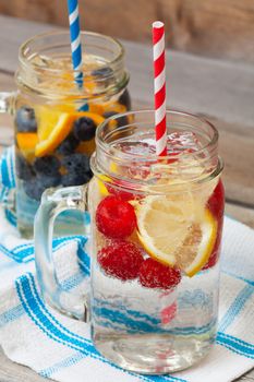 Ice cold sparkling water over ripe fresh fruit make for a healthy and thirst quenching beverage on a hot summer day.  
