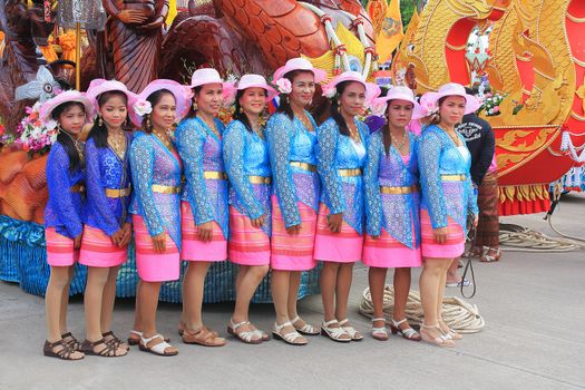 SURATTHANI, THAILAND - OCTOBER 20: Group of Thai women wear Thai style dress to promote Chakpra festival on October 20, 2013 in Suratthani, Thailand.
