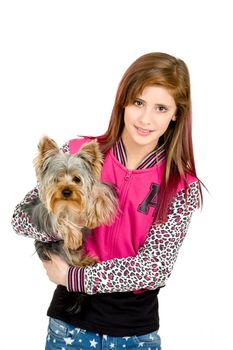 attractive smiling young girl with long hair wearing pink dress with her best friend yorkshire terrier isolated white background