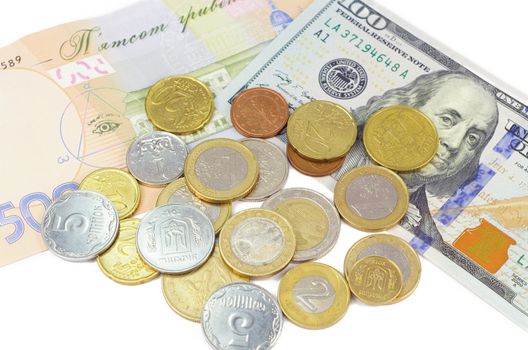 Dollars, hryvnia and coins on white background