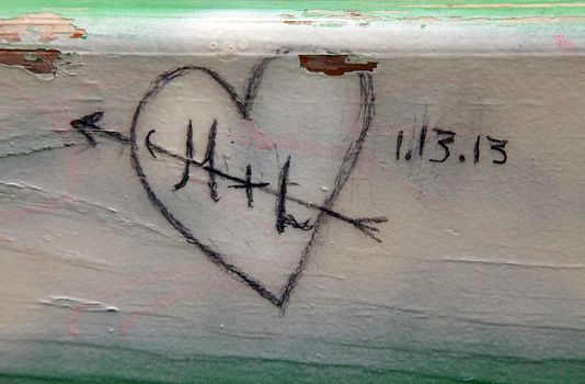 heart painted on a wooden bench
