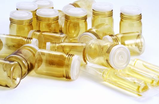 Empty pill bottles isolated on white background