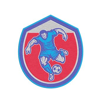 Metallic styled illustration of a soccer football player running kicking soccer ball set inside shield crest done in retro style.