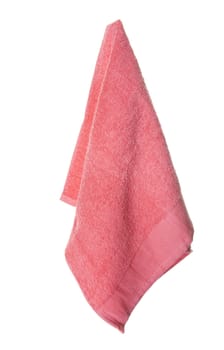 A hot coral colored towel hanging.  Isolated on white.