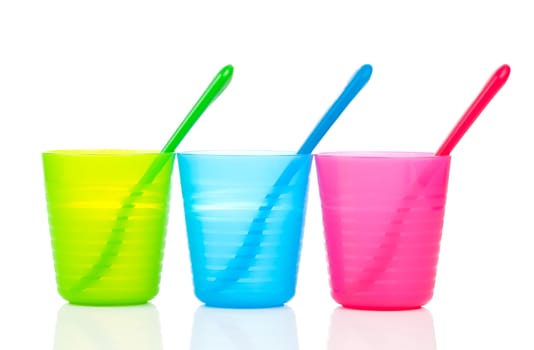 bright plastic tableware, isolated on white background