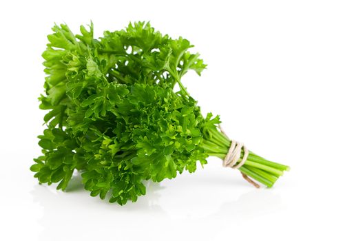 parsley tied with an cord band in white background.