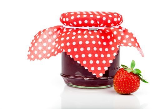 Strawberry jam and fresh berries isolated on white
