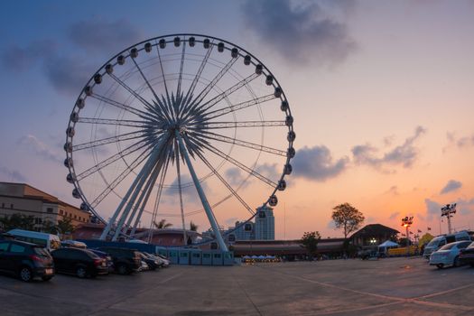 Ferris wheel on sunset in Bangkok, Thailand