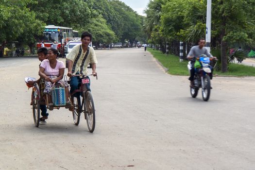 Myanmar Taxi.  Road Along Irrawaddy River, Mandalay, Myanmar 21.08.2013  Editorial.