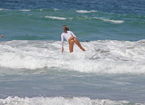 A young lady surfing in Puerto Escondido, Mexico
01 Apr 2013
No model release
Editorial only