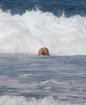 A young lady swimming in the surf in Puerto Escondido, Mexico
27 Mar 2014 No model release
Editorial only