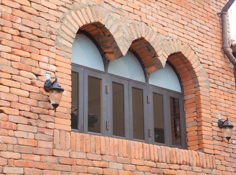 close-up beautiful wood old window in brick wall