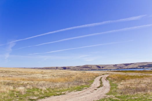 Photo of autumn landscape with blue sky