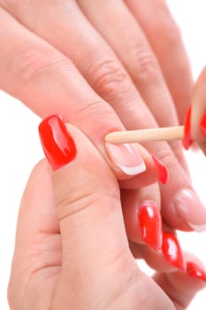 beauty salon, manicure applying, cleaning the cuticles