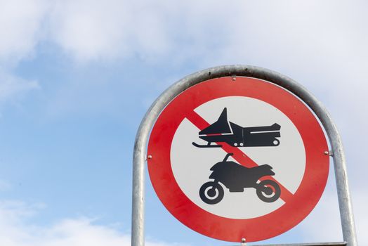 Greenlandic street sign with snow scooter and motor cycle