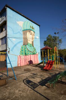 Colourful murals adorning the walls of tenement blocks in the San Miguel area of Santiago, capital of Chile. The area was created as an open air museum in what was a run down area of the city.