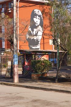 Colourful murals adorning the walls of tenement blocks in the San Miguel area of Santiago, capital of Chile. The area was created as an open air museum in what was a run down area of the city.