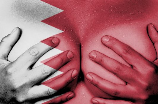 Upper part of female body, hands covering breasts, Bahrain
