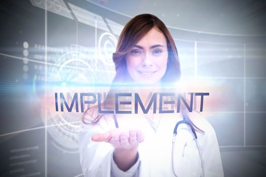 The word implement and portrait of female nurse holding out open palm against futuristic technology interface