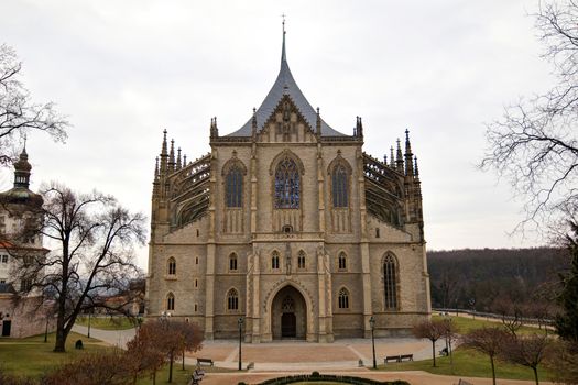 Saint Barbara's Church (often incorrectly Saint Barbara Cathedral) in Kutna Hora (Bohemia) is one of the most famous Gothic churches in central Europe and it is a UNESCO world heritage site. St Barbara is the patron saint of miners (among others), which was highly appropriate for a town whose wealth was based entirely upon its silver mines.Construction began in 1388, but because work on the church was interrupted several times, it was not completed until 1905. The first architect was probably Johann Parler, son of Peter Parler, but studies say that Peter Parler had participated at least as a co-author of the draft design. Work on the building was interrupted for more than 60 years during the Hussite Wars and when work resumed in 1482, Matej Rejsek and Benedikt Rejt, two architects from Prague, assumed responsibility. Kutna Hora, Czech republic.