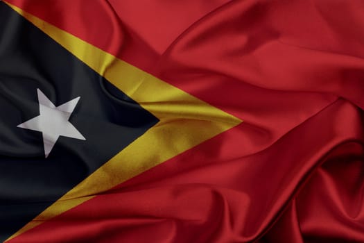 Timor Leste grunge waving flag