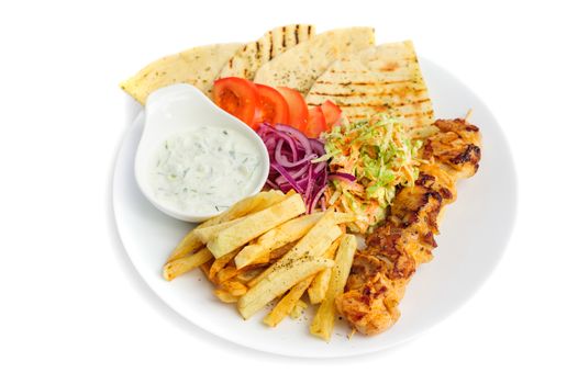 one portion of french fries, chicken kebab, salad and roasted pita
