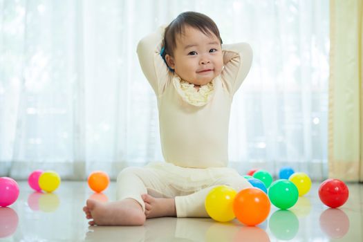 Portrait of little asian girl in home