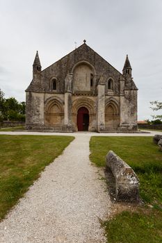 Full main entrance view of Aulnay de Saintonge church in Charente Maritime region of France