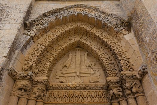 Left side facade Detail of Aulnay de Saintonge church in Charente Maritime region of France