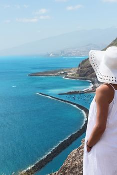 Girl lookng on Las Teresitas beach on Tenerife Island, Spain