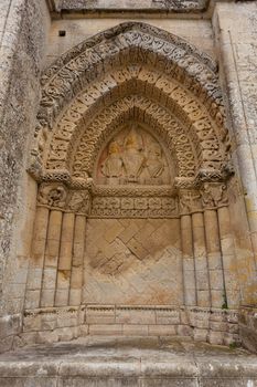 Right side facade  of Aulnay de Saintonge church in Charente Maritime region of France