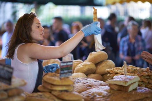 Market stalls selling bread at Borough Market in London, England