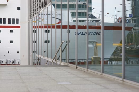 Large ocean going ship moored at Canary Wharf in London.