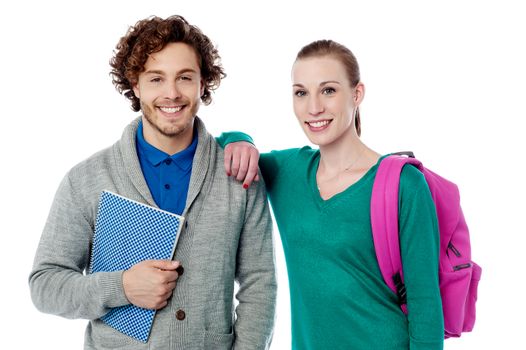 Young cheerful classmates posing together to camera