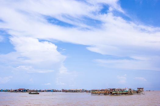 SIEM REAP, CAMBODIA - May 3: Cambodian people live beside Tonle Sap Lake in Siem Reap, Cambodia on May 3, 2014. Tonle Sap is the largest freshwater lake in SE Asia
