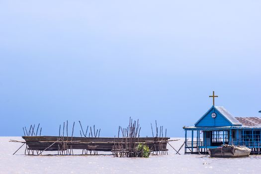 SIEM REAP, CAMBODIA - May 3: This is church of fishing village at Tonle Sap Lake in Siem Reap, Cambodia on May 3, 2014. Tonle Sap is the largest freshwater lake in SE Asia