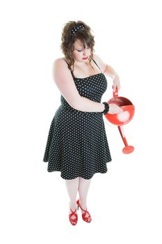 A young girl, dressed in pinup style watering whatever you want her to be watering!  Shot on white background.