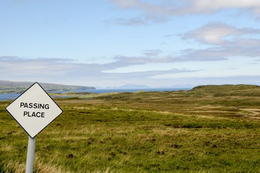 Passing Place Sign on the Isle of Skye in Scotland - since most roads are one single lane, passing places in regular invervals allow for forthcoming traffic