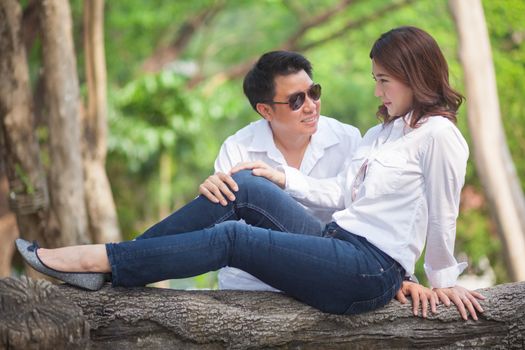 Happy young asian couple in love outdoor