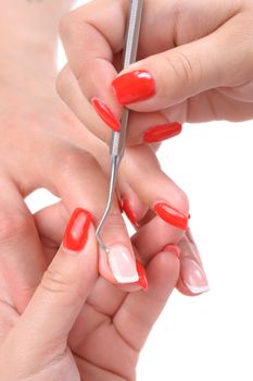 beauty salon, manicure applying, cleaning the cuticles