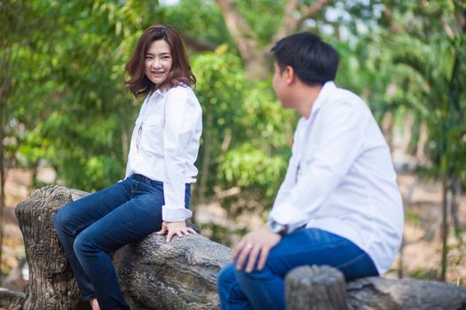 Happy young asian couple in love outdoor
