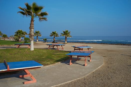 Table Tennis tables lining the sea front at Antofagasta in the Atacama region of Chile.
