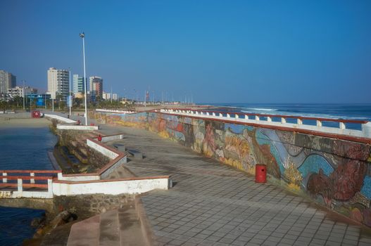 Colourfully decorated murals adorning a seawall along the Pacific Ocean at Antofagasta in the Atacama Region of Chile
