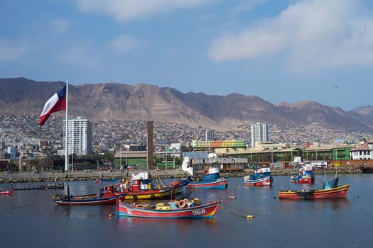 Colourful wooden fishing boats in the harbour at Antofagasta in the Atacama Region of Chile