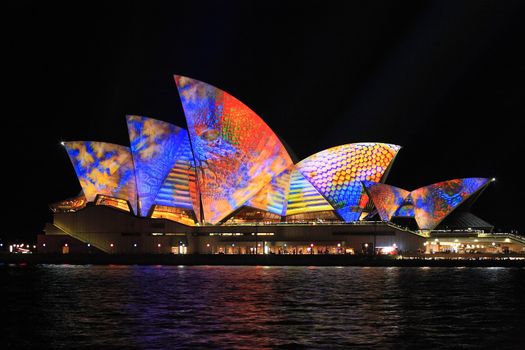 SYDNEY, AUSTRALIA - JUNE 2, 2014;  Sydney Opera House in bright colours during Vivid Sydney annual festival of light, music and ideas