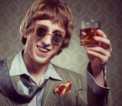 1960s style guy with cocaine on his nose holding a glass of whisky.