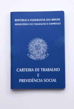 Brazilian work document and social security document (carteira de trabalho) on white background