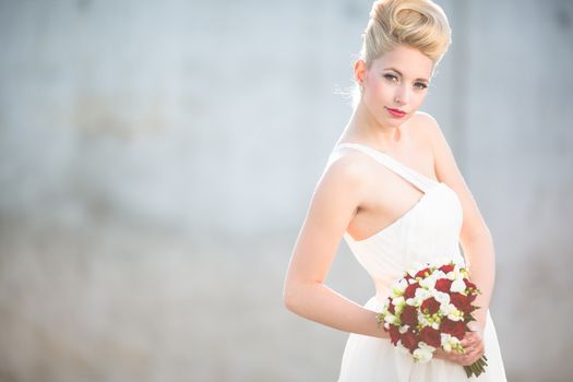 Gorgeous bride on her wedding day (color toned image; shallow DOF)