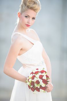 Gorgeous bride on her wedding day (color toned image; shallow DOF)