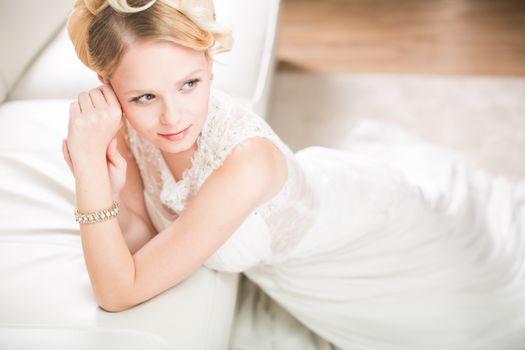 Gorgeous bride on her wedding day (color toned image; shallow DOF)